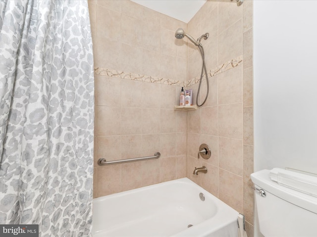 bathroom featuring shower / bathtub combination with curtain and toilet