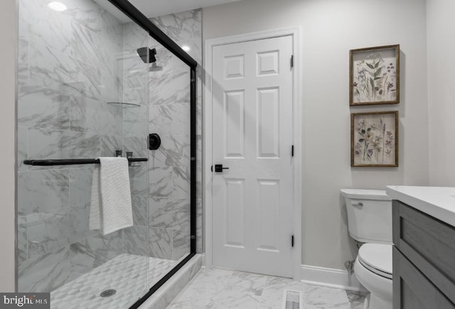 bathroom featuring toilet, an enclosed shower, and vanity