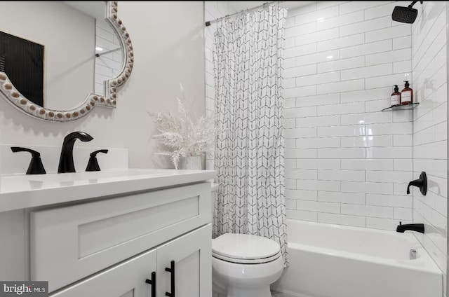 full bathroom with toilet, shower / tub combo, and vanity