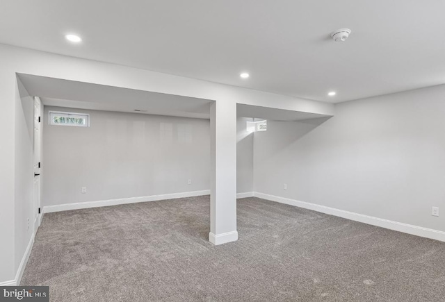 basement with carpet flooring