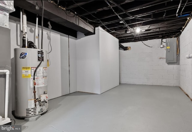 basement featuring gas water heater and electric panel