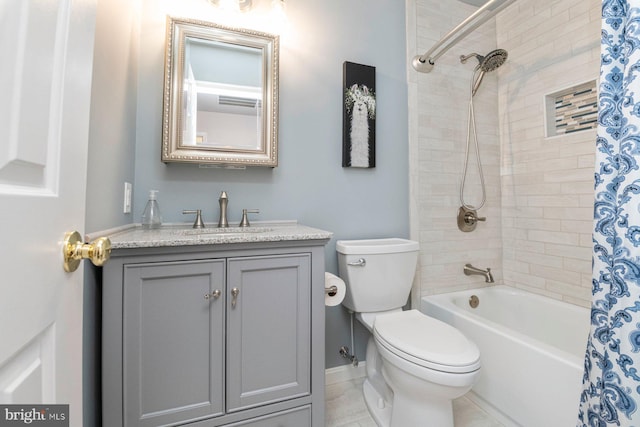 full bathroom with shower / bath combo with shower curtain, toilet, and vanity