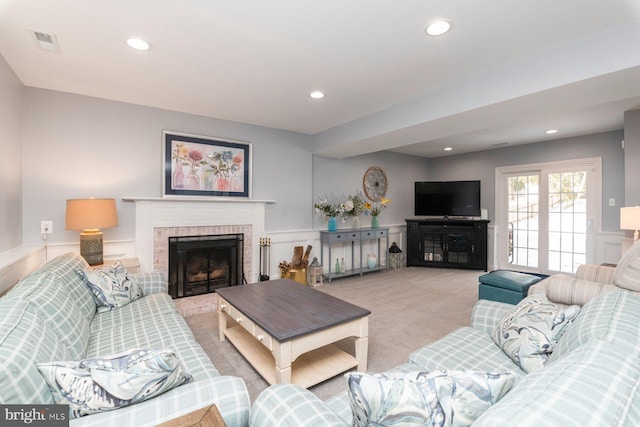 living room featuring light colored carpet