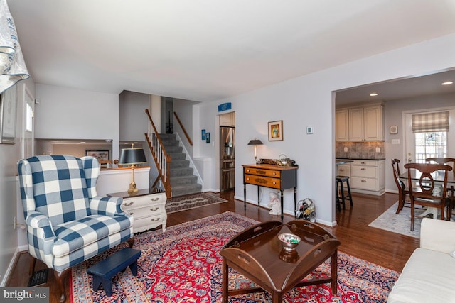 living room with dark wood-type flooring