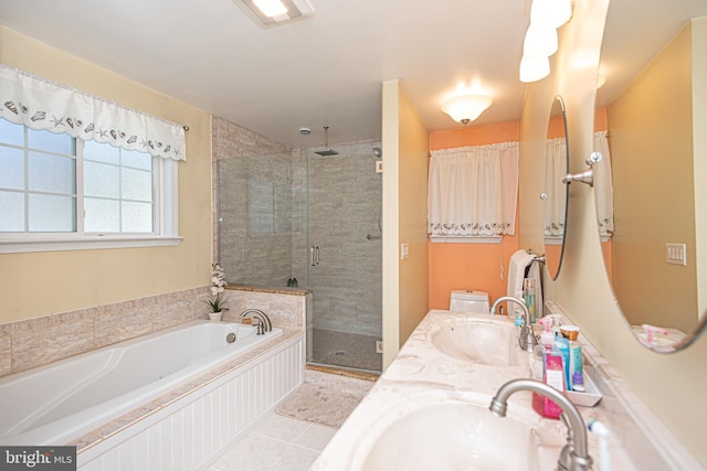 bathroom featuring tile patterned flooring, plus walk in shower, and vanity