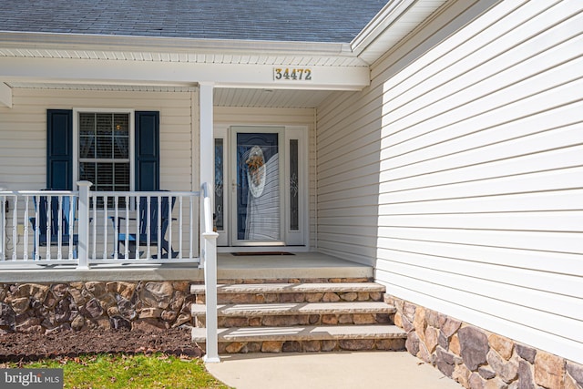 property entrance with a porch