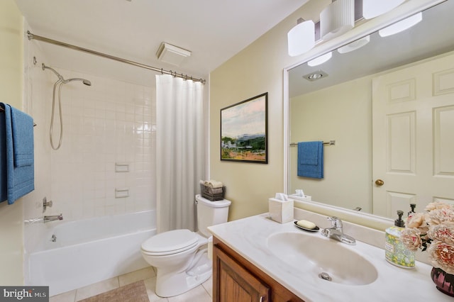 full bathroom with tile patterned floors, toilet, shower / tub combo, and vanity