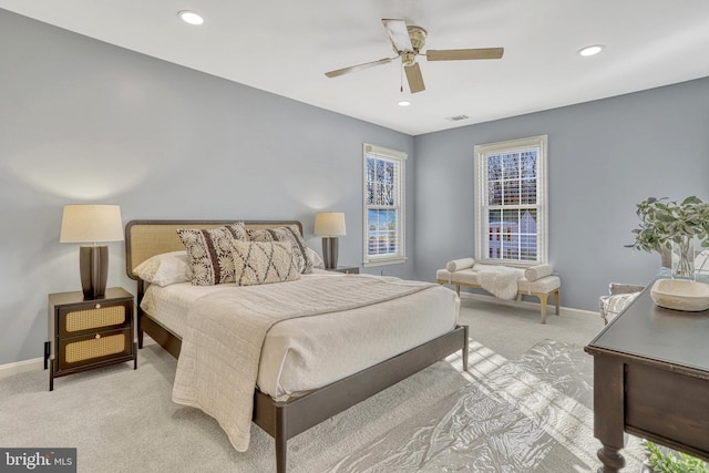 carpeted bedroom with ceiling fan