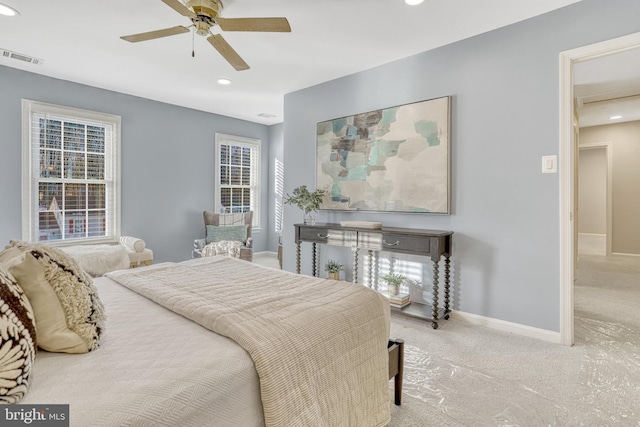 carpeted bedroom with ceiling fan