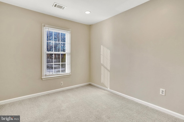 view of carpeted spare room