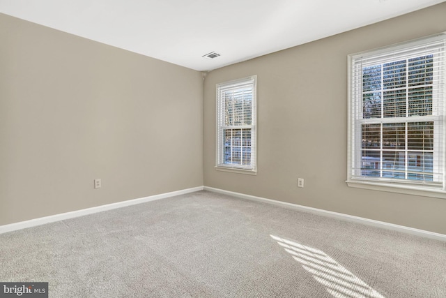 unfurnished room with carpet