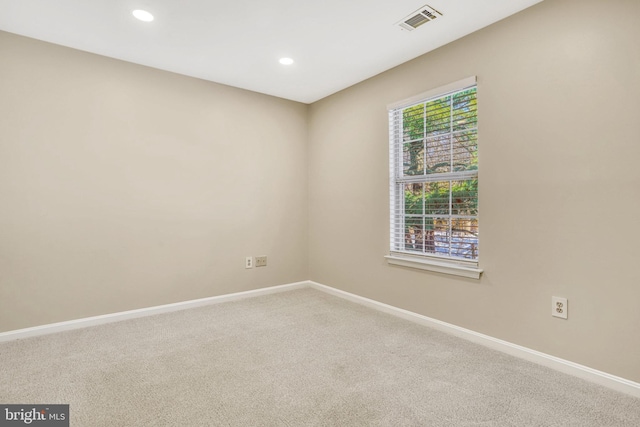 view of carpeted spare room