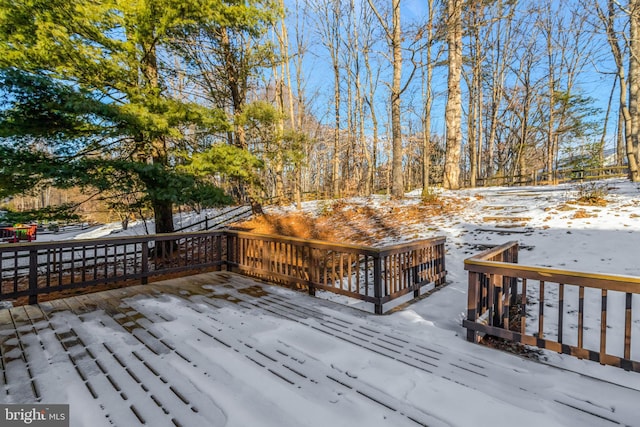 view of snow covered deck