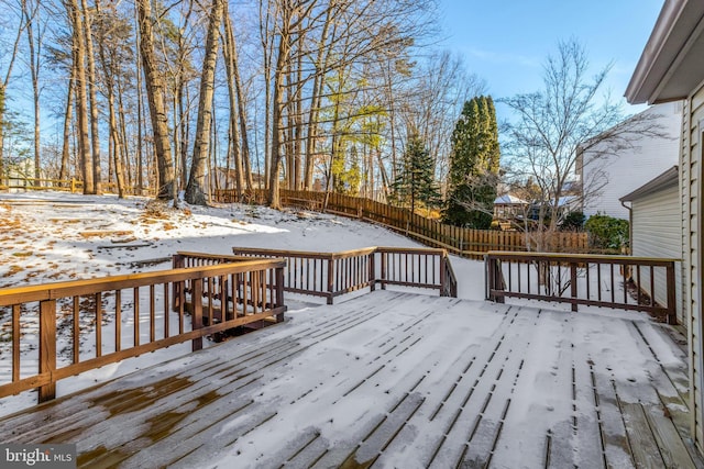 view of snow covered deck