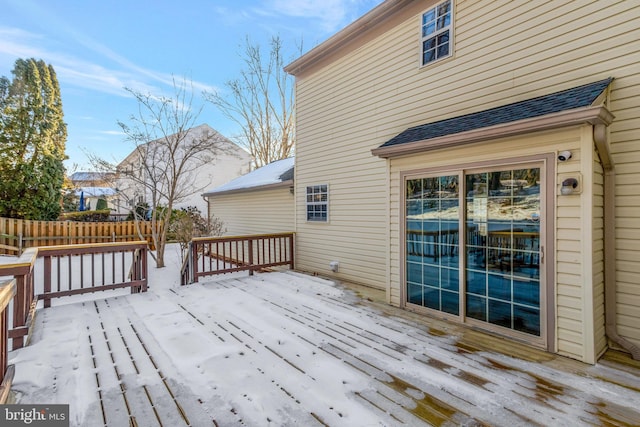 view of snow covered deck