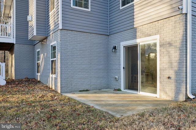 property entrance with a patio