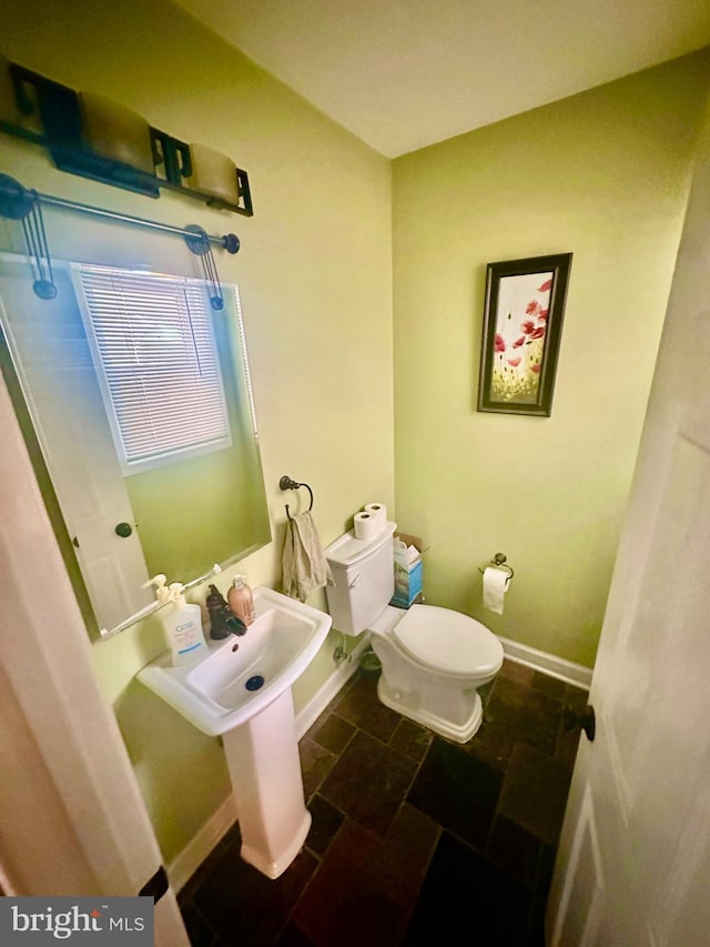 bathroom featuring toilet