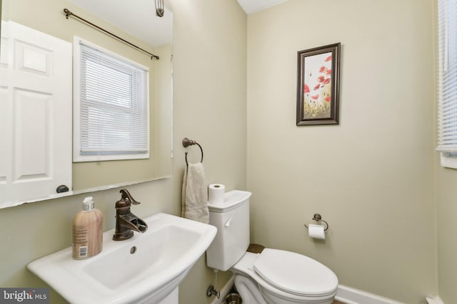 bathroom with sink and toilet