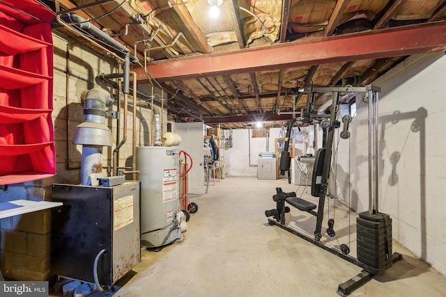 basement featuring washer / dryer and water heater