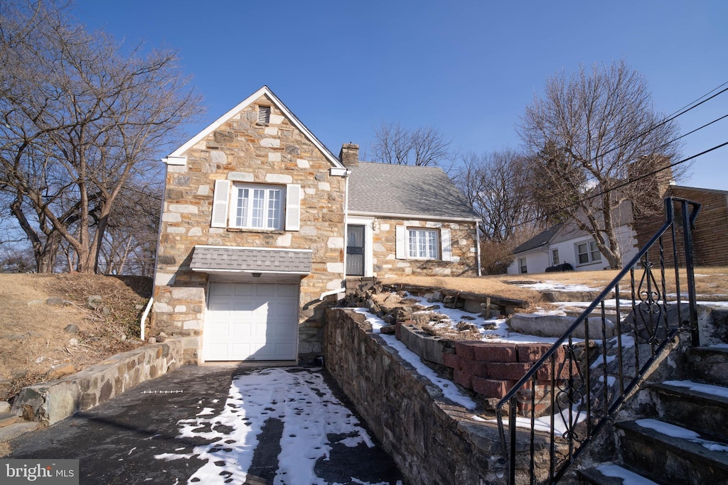 front of property featuring a garage