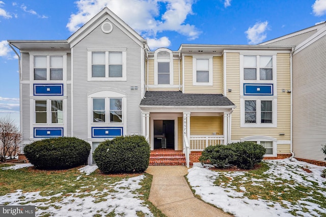 multi unit property featuring a porch