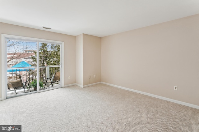 view of carpeted spare room