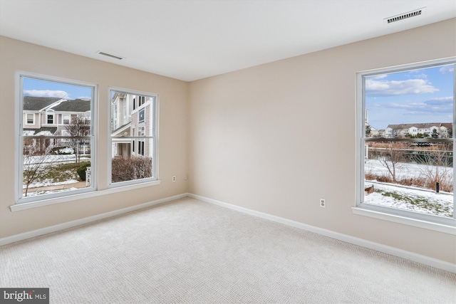 view of carpeted spare room