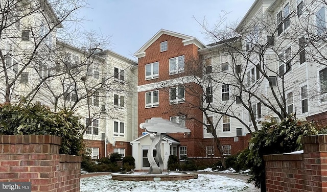 view of snow covered building