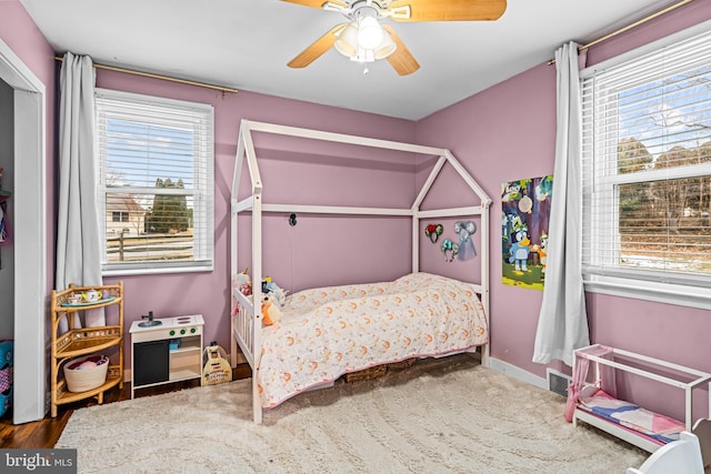 bedroom featuring ceiling fan