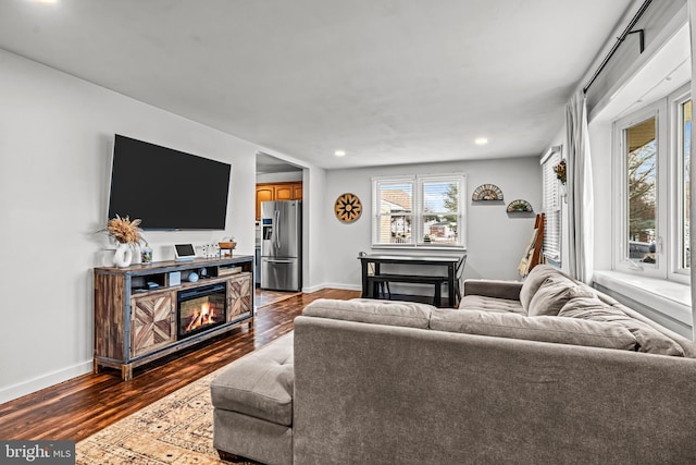 living room featuring dark wood-type flooring