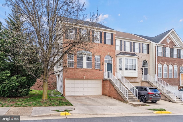 multi unit property featuring a garage