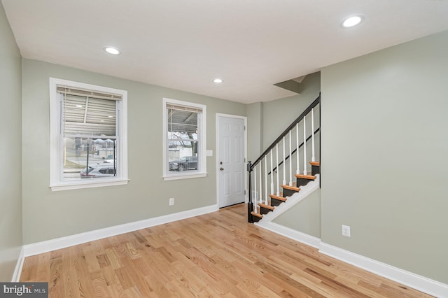 entryway with light hardwood / wood-style floors