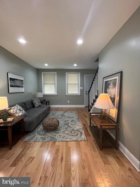 living room with light hardwood / wood-style floors