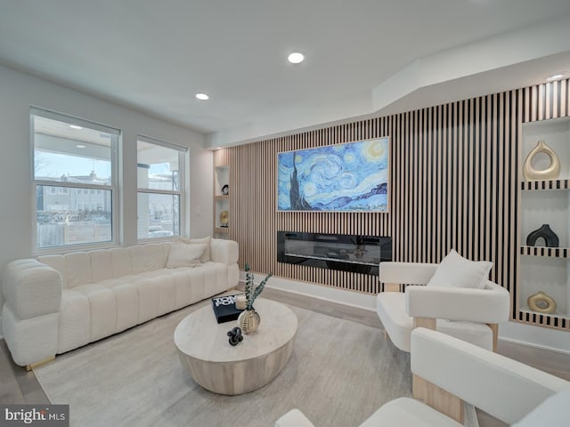 living room with light hardwood / wood-style flooring