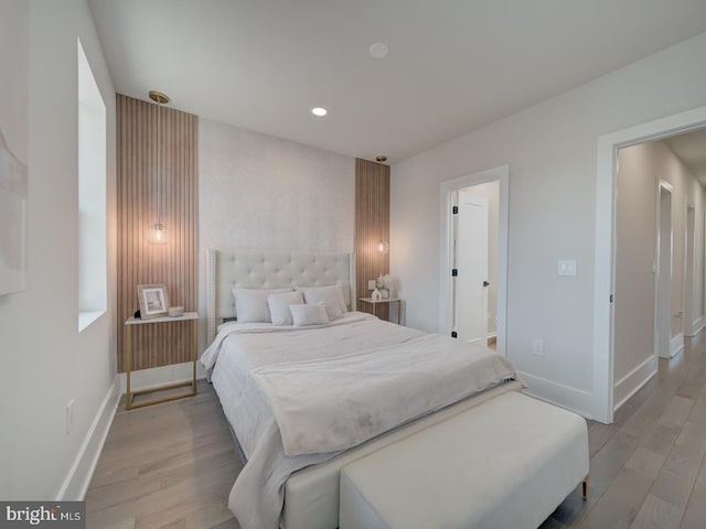 bedroom featuring light hardwood / wood-style floors