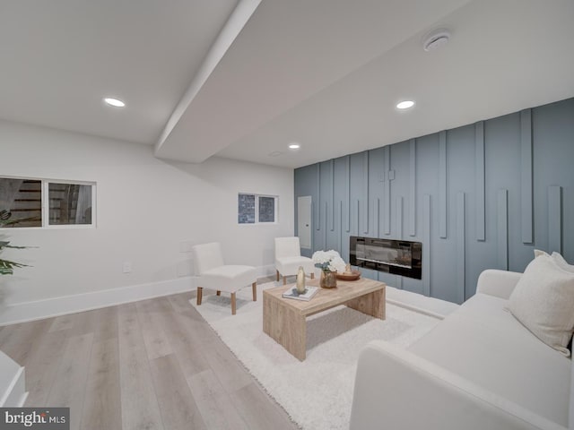 living room with light hardwood / wood-style flooring