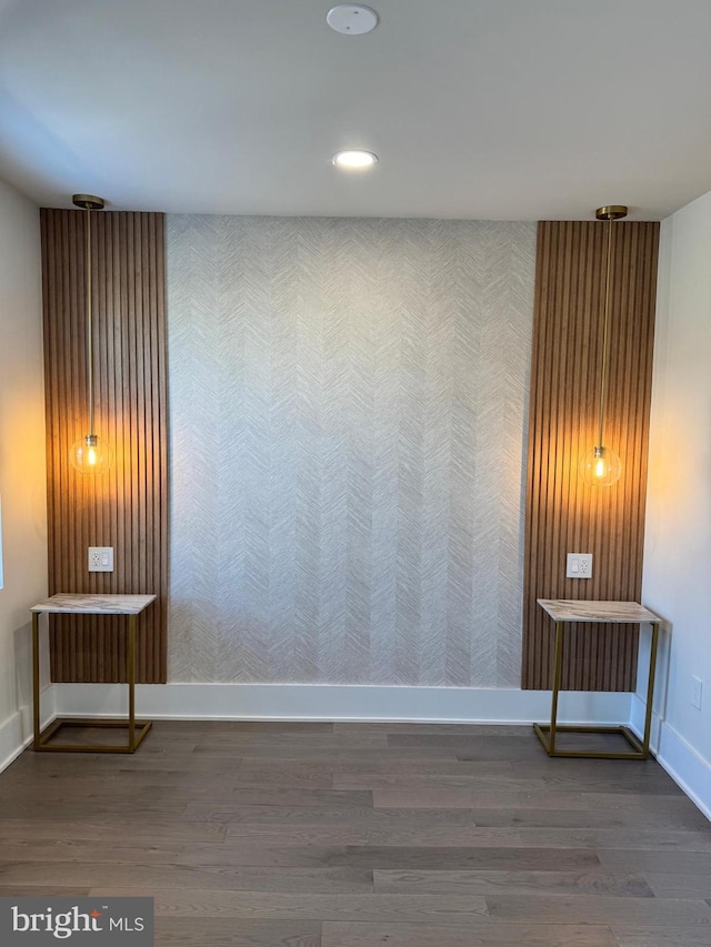 spare room featuring hardwood / wood-style floors