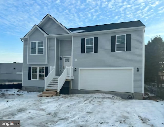 bi-level home featuring a garage