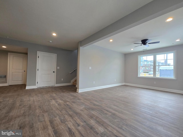 interior space with dark wood finished floors, recessed lighting, ceiling fan, baseboards, and stairs