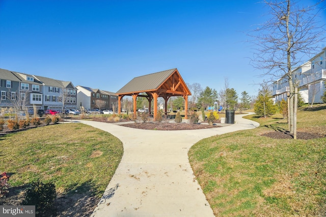 surrounding community featuring a gazebo and a yard