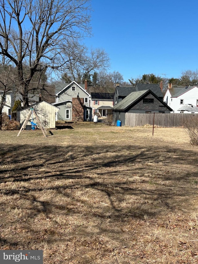 view of yard featuring fence