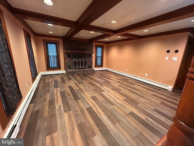 unfurnished living room with a baseboard heating unit, a baseboard radiator, wood finished floors, and beam ceiling