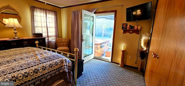 bedroom with access to exterior, multiple windows, baseboards, and carpet flooring