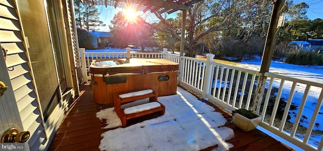 balcony with a hot tub