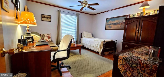 bedroom with ceiling fan, crown molding, and wood finished floors