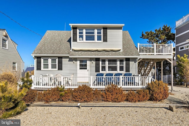 view of front of home with a wooden deck