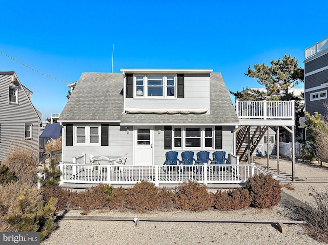 view of front of house featuring a deck