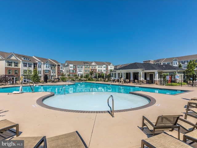 view of pool featuring a patio area