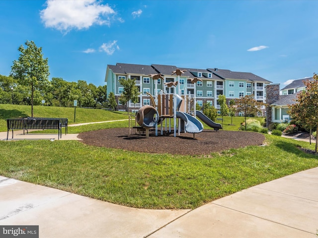 view of playground featuring a lawn