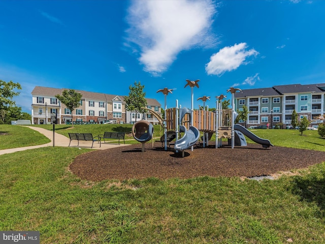 view of play area featuring a lawn